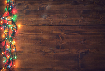 Empty rustic wooden background with Christmas lights