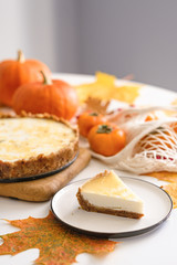 pumpkin cheesecake with persimmon. autumn concept.