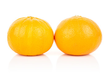 Group of two whole fresh orange mandarine isolated on white background