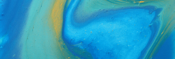 art photography of abstract marbleized effect background. blue, mint and gold creative colors. Beautiful paint