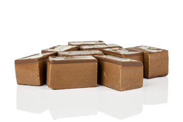 Lot of whole sweet brown viennese nougat isolated on white background