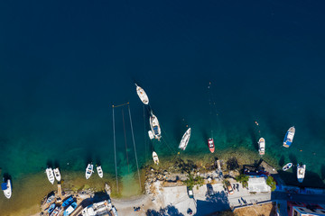 Simy island Bay with a bird's eye view, with ships, houses, city and waterfront. Popular tourist destination near the island of Rhodes, Greece, Europe © vladimircaribb
