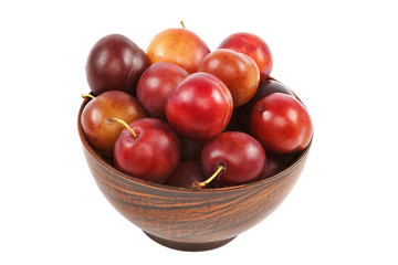 Ripe plum fruits on a white background
