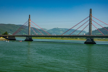 Modern bridge in the highway over narrow