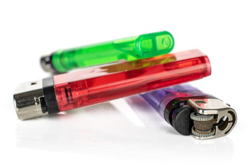 Group of three whole plastic lighter isolated on white background