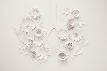 Flowers arranged in shape of human lungs as symbol of healthy life