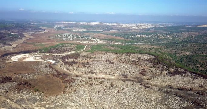 Aerial footage over Large forest After burn,Jude plains, Israel