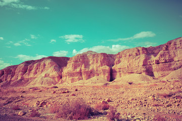 The view from the car to the mountain range. Mountain nature landscape. Negev desert in the early morning. The nature of Israel