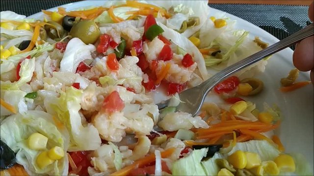Codfish with salad.