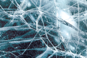 Cacks in thick solid layer of ice of a frozen lake Baikal