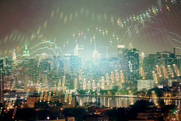 Double exposure of forex chart drawings over cityscape background. Concept of success.