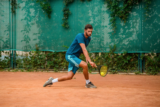 Man making a backhand shot on the rise