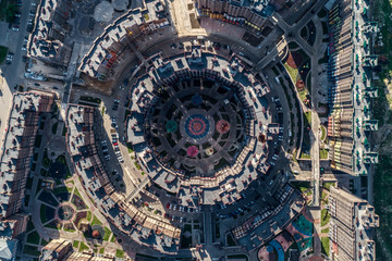 Big city, aerial view. Buildings are built in the form of closed rings.