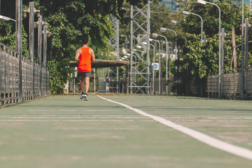 Obraz premium runner on the street be running for exercise; sport, people, exercising and lifestyle concept