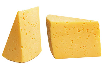 Two pieces of yellow milk cheese, isolated on a white background, close-up, healthy diet food