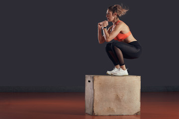 Woman at the gym exercising