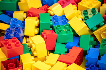 Many colorful plastic building blocks toy bricks