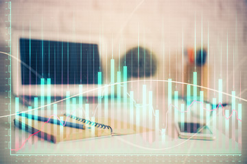 Forex Chart hologram on table with computer background. Double exposure. Concept of financial markets.