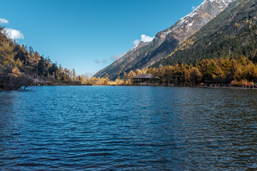 Late autumn snow mountain and lake