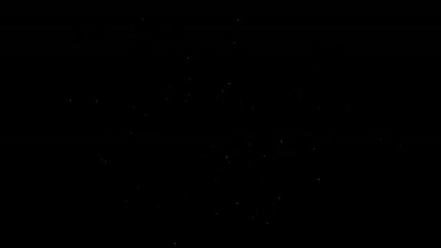 The magical particle sparkle explosion particles glow with Christmas theme color on black background.