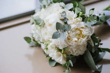 Beautiful wedding bouquet with fresh flowers on a wedding day