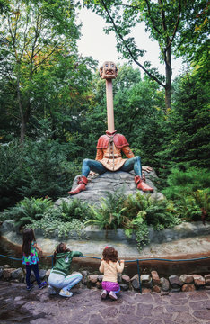 Kaatsheuvel, Netherlands, August 19, 2017: Long necked servant from the fairy tale six servants in the fairytale forest in the theme park Efteling