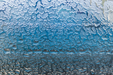 The icy glass of the car