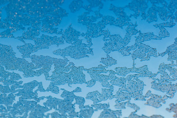 The icy glass of the car