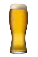 A cold beer poured from a tap into a chilled glass with a delicious foam head.