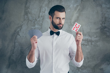 Photo of smart clever card player showing you focuses by demonstrating different card suits...