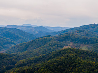 Obraz premium Aerial view mountain with trees in autumn