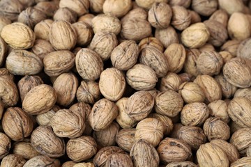 closeup of walnuts on display at the market