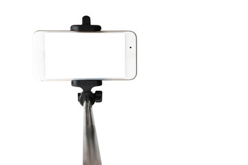 Monopod for selfie with smart phone. Selfie stick with smartphone isolated on white background. with clipping path