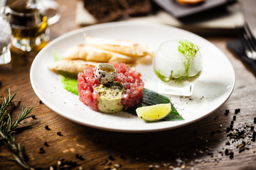 Fototapeta na wymiar Tuna tartare served on a plate in restaurant