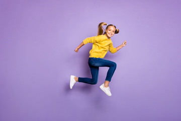 Fototapeta na wymiar Full body photo of cheerful sweet kid jump run after black friday bargains wear casual style clothing isolated over purple color background