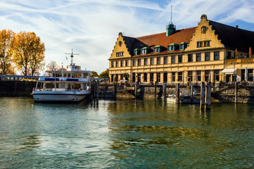 Building and boat in port in Lindau.