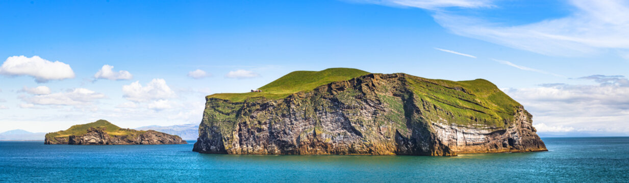 Panoramic view of the Bjarnarey island, a part of the Westman island, Iceland.