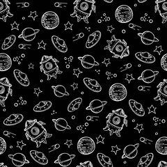 Seamless pattern with planets, rockets, stars and flying saucers.