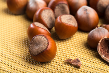 close up of hazelnuts on table .