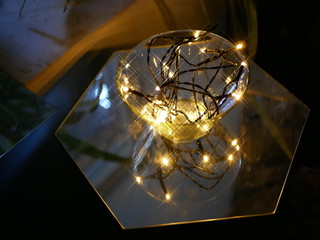 Christmas light strand in a glass bowl