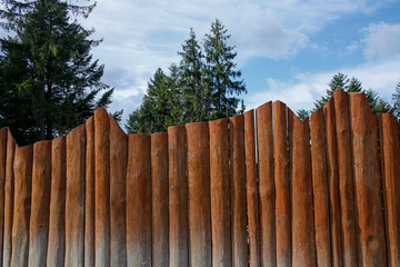 Fototapeta premium wooden fence against blue sky