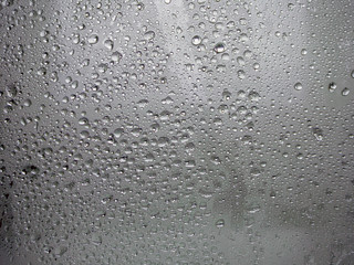 Frozen glass. Water drops