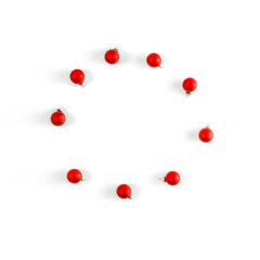 Minimalist composition on a white background. Christmas decorations, place for your product. Flat lay, Copy spay, Winter time. December background of winter. Fir branches.