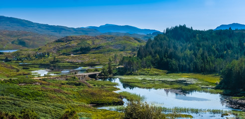 Naklejka premium Gorgeous landscapes in the far north of the Scottish highlands along the iconic NC500 coastal route
