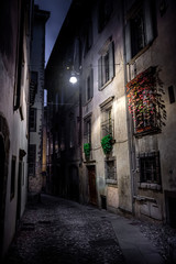 Fototapeta na wymiar narrow old street at night