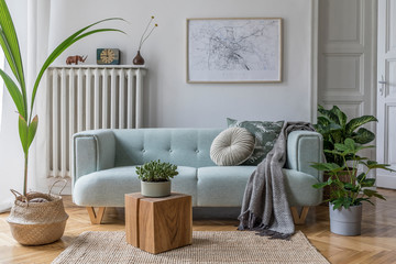 Modern scandinavian living room interior with stylish mint sofa, furnitures, mock up poster map, plants,  and elegant personal accessories. Home decor. Interior design. Template. Ready to use. 