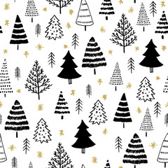 Winter graphic seamless pattern with christmas trees in black on white background and gold stars. Surface design for textile, fabric, wallpaper, wrapping, giftwrap, paper, scrapbook and packaging.