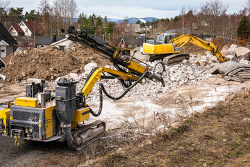 Excavator and drilling machnes