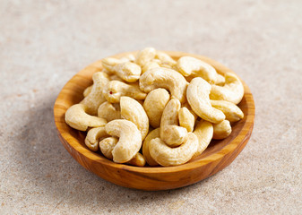 cashew nuts in a wooden bowl