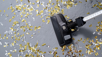 vacuuming confetti and copying space for text 